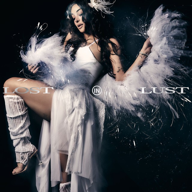 Pabllo Vittar, Lost in Lust album cover: the singer in white feathers and lace against a black background
